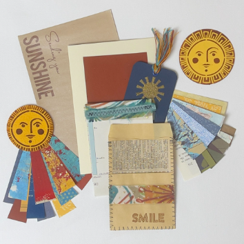 Sending Sunshine box kit with specialty papers, tags and sun motifs